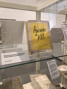 glass cabinet display with a book